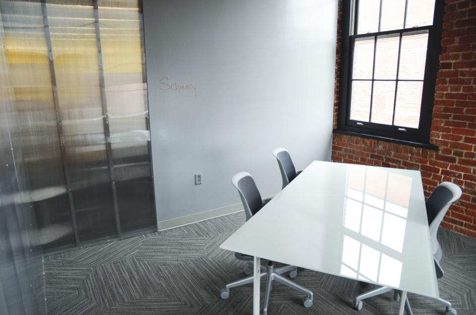 Startup team working in an office as the company grows